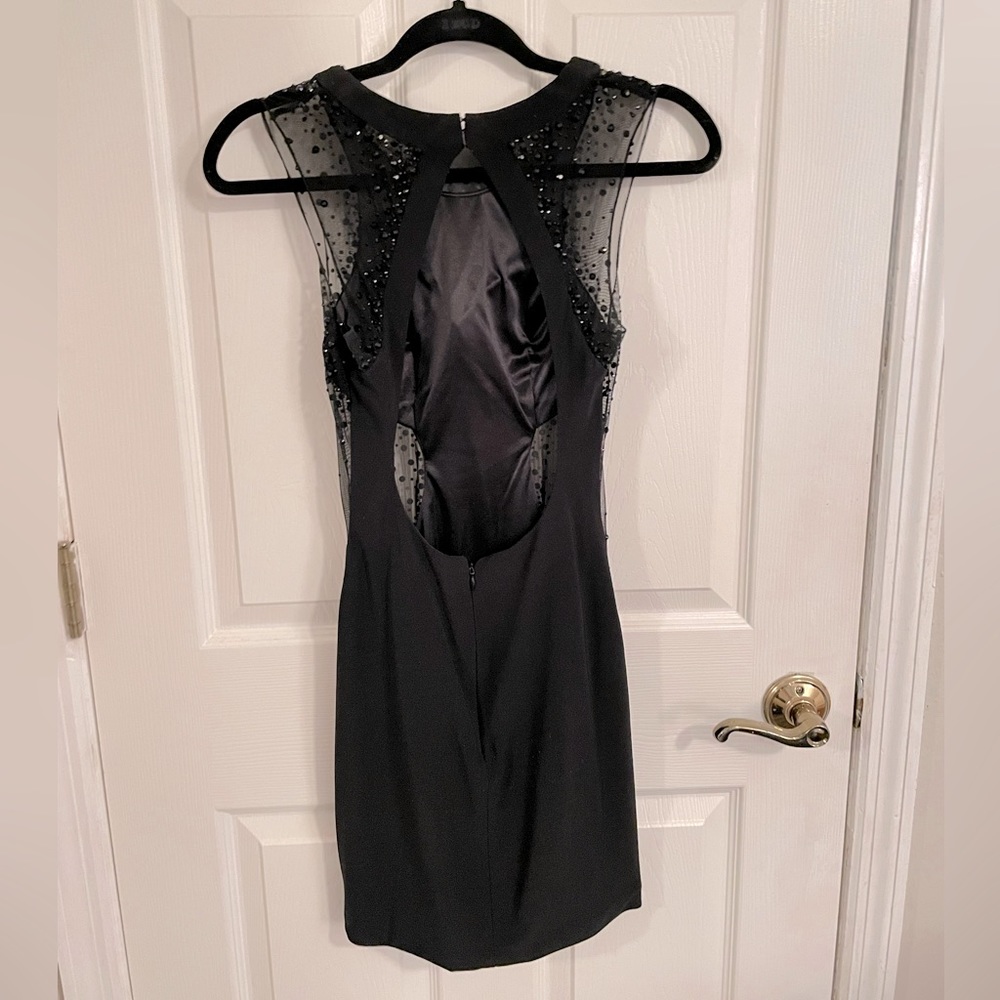 Short, backless, black, bedazzled homecoming dress